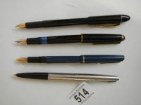 Four vintage fountain pens.