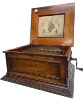 19th C Regina 15 1 2 disc polyphon music box with discs